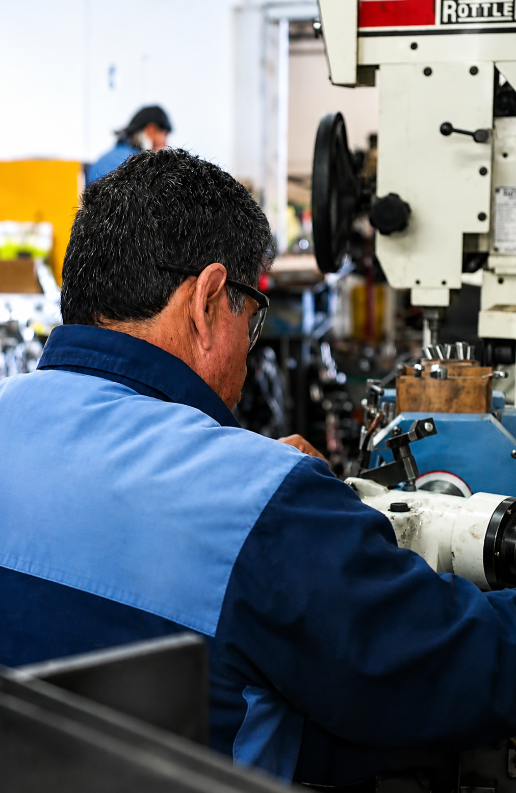 Technician working at the machine shop at MJM Engines